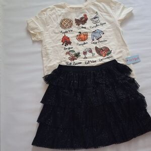 Black sparkle girl skirt and ivory girl graphic shirt